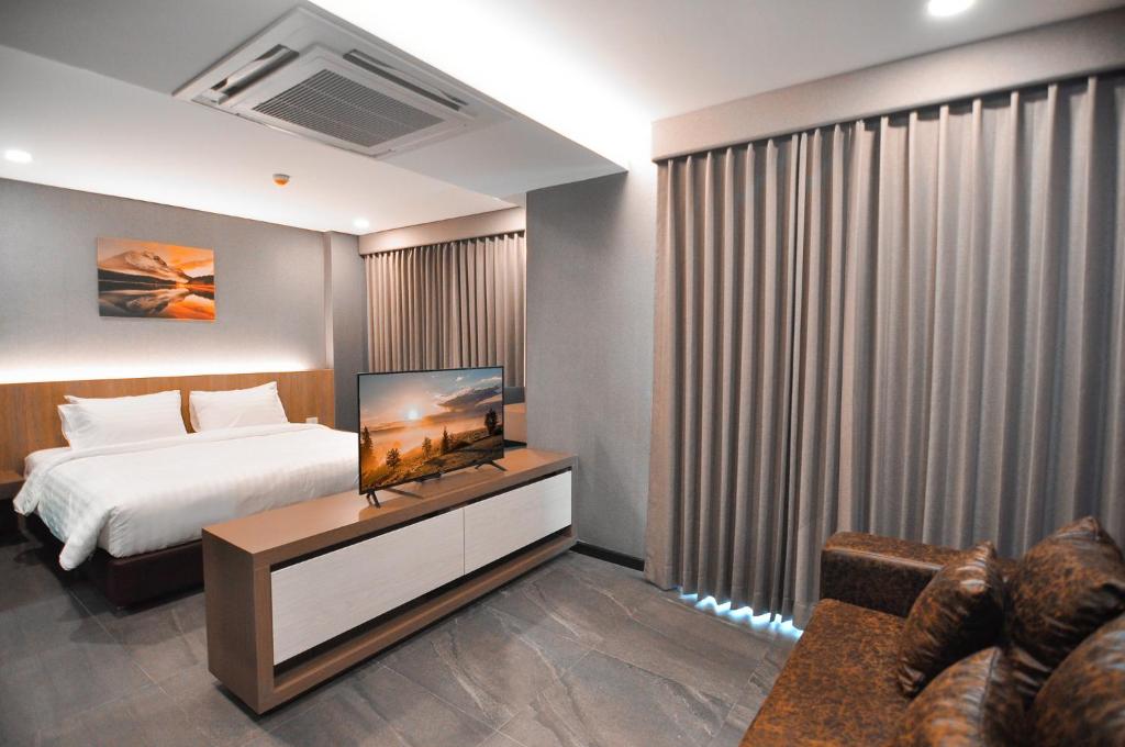 Postel nebo postele na pokoji v ubytování The S Block Condotel