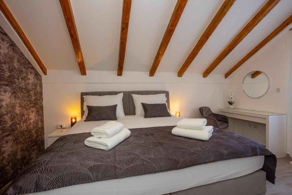 Posteľ alebo postele v izbe v ubytovaní Stone House Iris