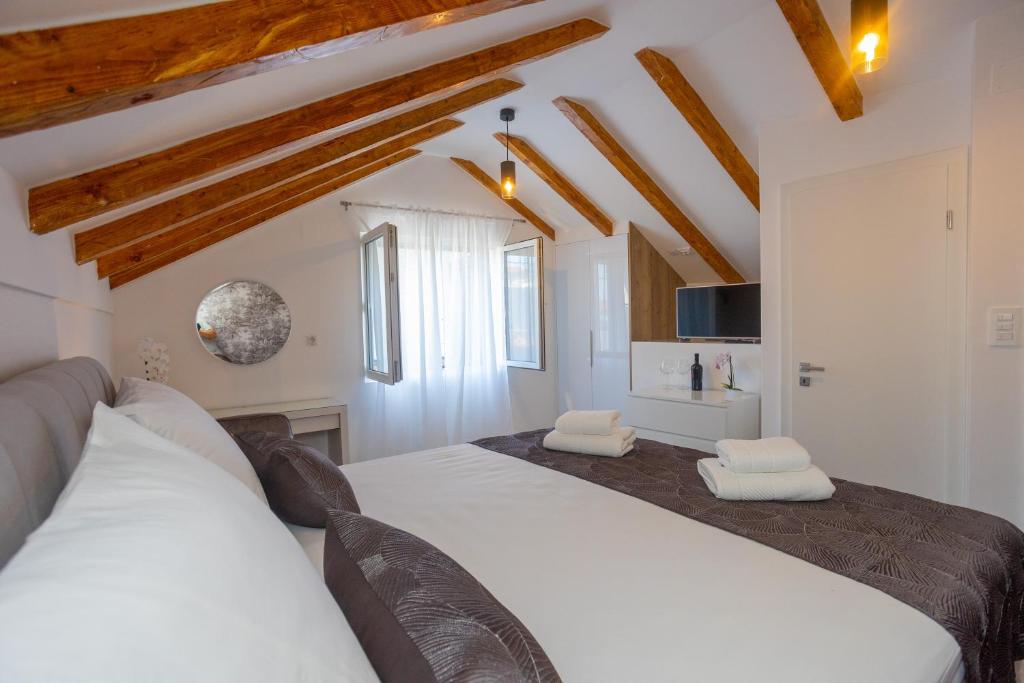 Posteľ alebo postele v izbe v ubytovaní Stone House Iris
