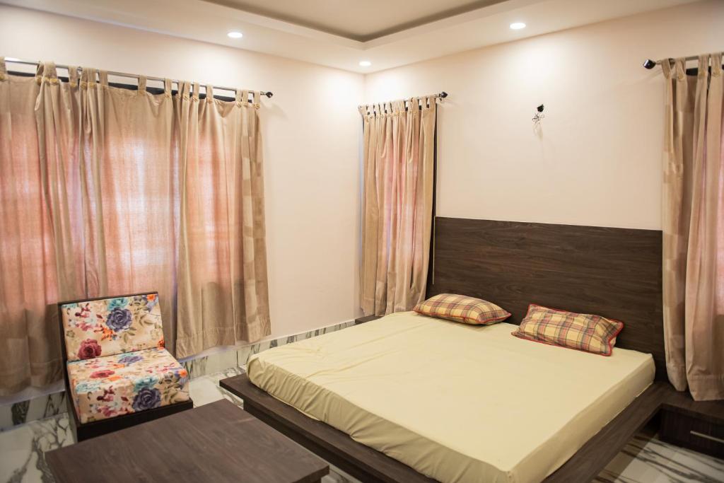 Postel nebo postele na pokoji v ubytování SETHI's HOMESTAY