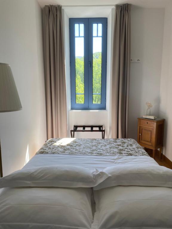A bed or beds in a room at U Fiordalisu