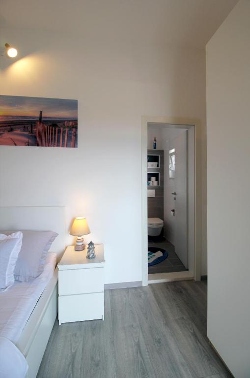 Posteľ alebo postele v izbe v ubytovaní Apartman Cicibella