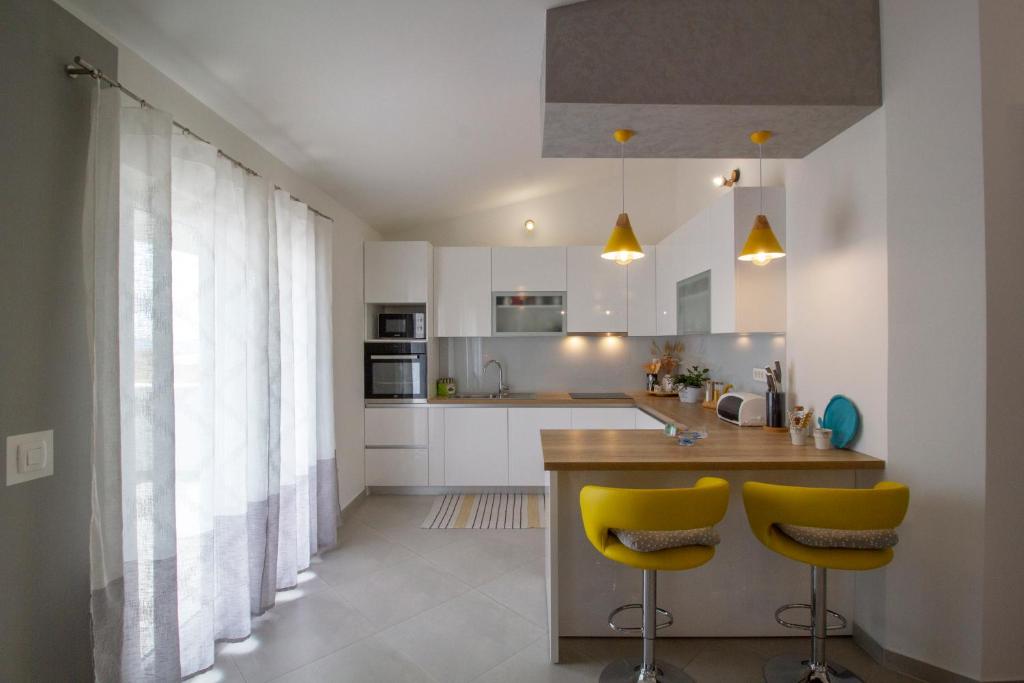 Kuchyňa alebo kuchynka v ubytovaní Apartman Cicibella