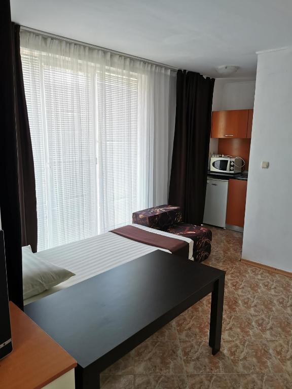 Postel nebo postele na pokoji v ubytování Jelezchevi Guest Rooms