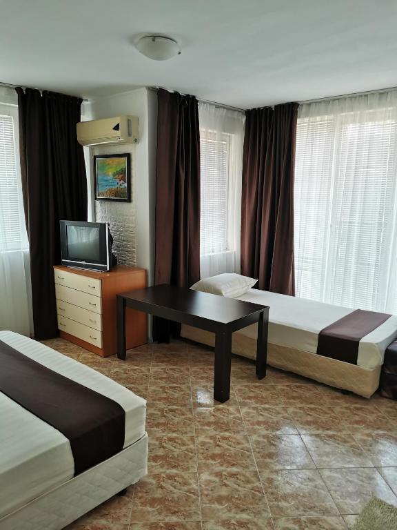 Postel nebo postele na pokoji v ubytování Jelezchevi Guest Rooms