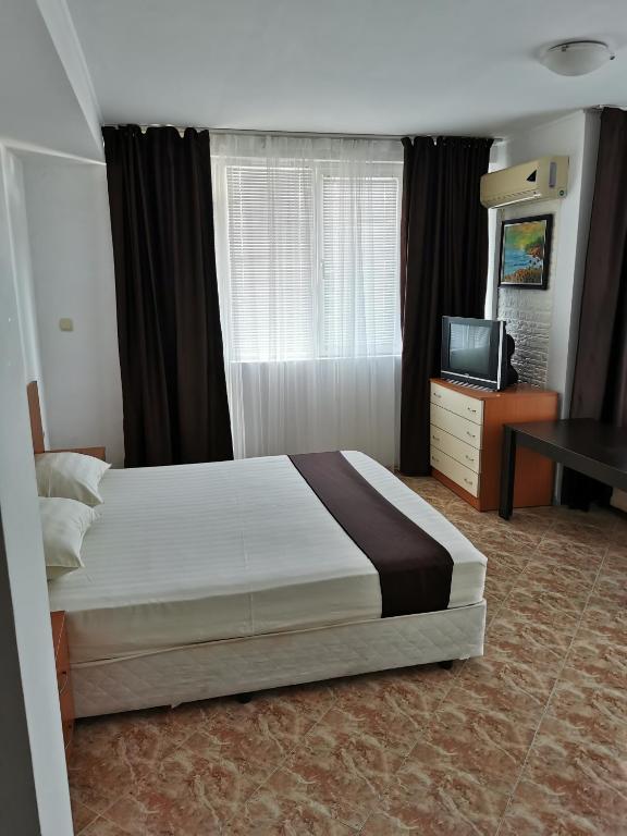 Postel nebo postele na pokoji v ubytování Jelezchevi Guest Rooms