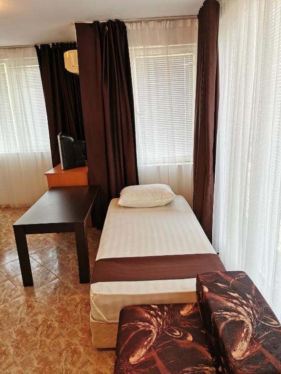 Postel nebo postele na pokoji v ubytování Jelezchevi Guest Rooms