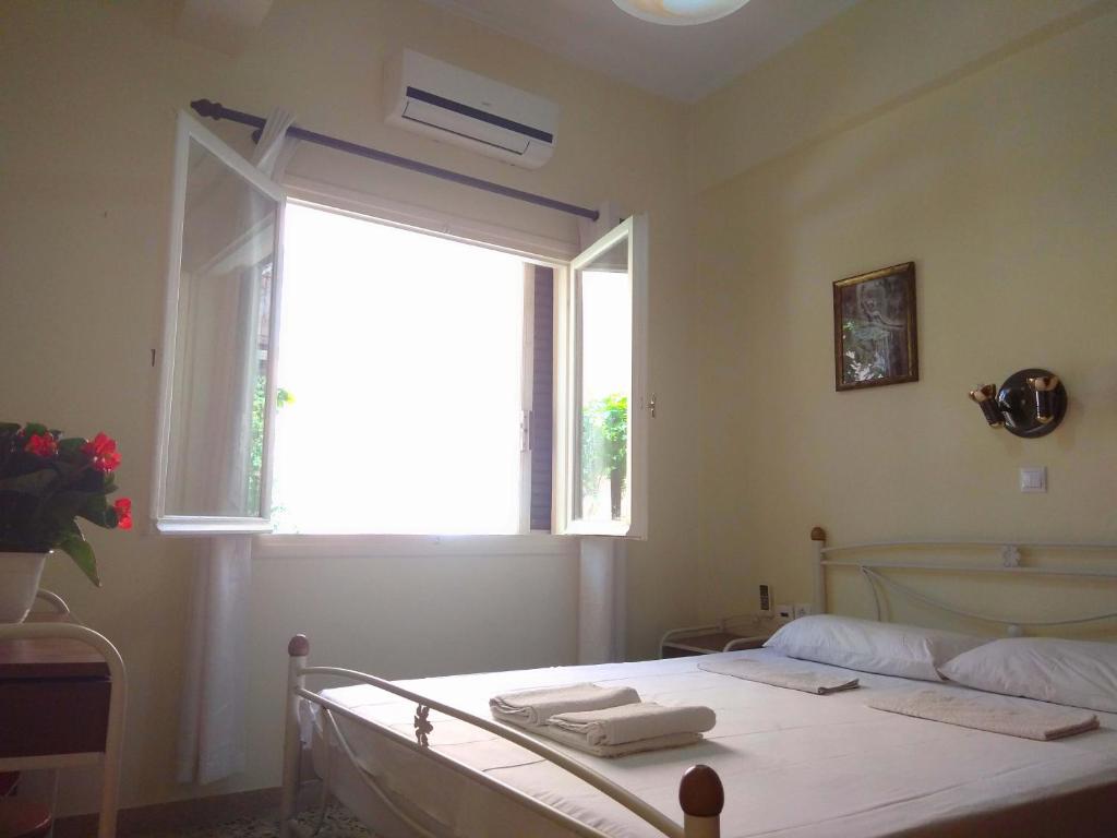 Posteľ alebo postele v izbe v ubytovaní OLEA Apartments