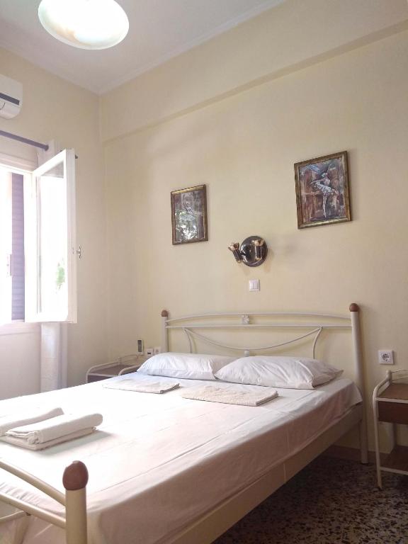 Posteľ alebo postele v izbe v ubytovaní OLEA Apartments