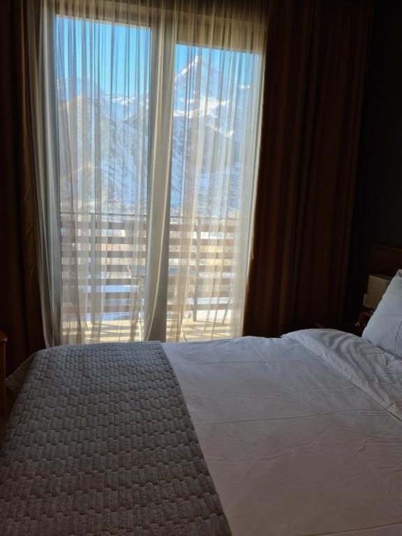 Letto o letti in una camera di Hilltop Kazbegi