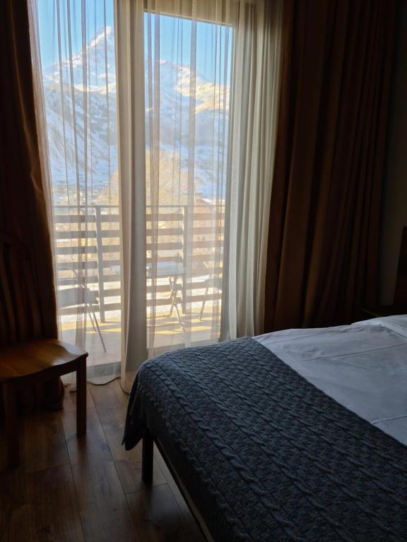 Letto o letti in una camera di Hilltop Kazbegi