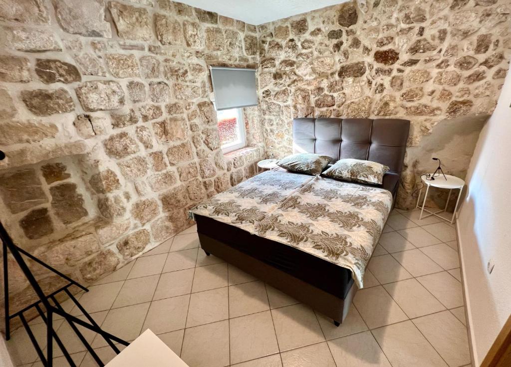 Posteľ alebo postele v izbe v ubytovaní Apartments Toni - Slano