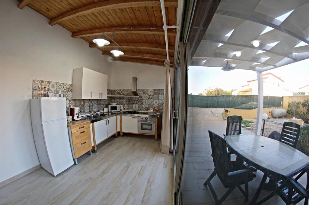 Kuchyň nebo kuchyňský kout v ubytování Holiday House Villa AleGiù Marzamemi