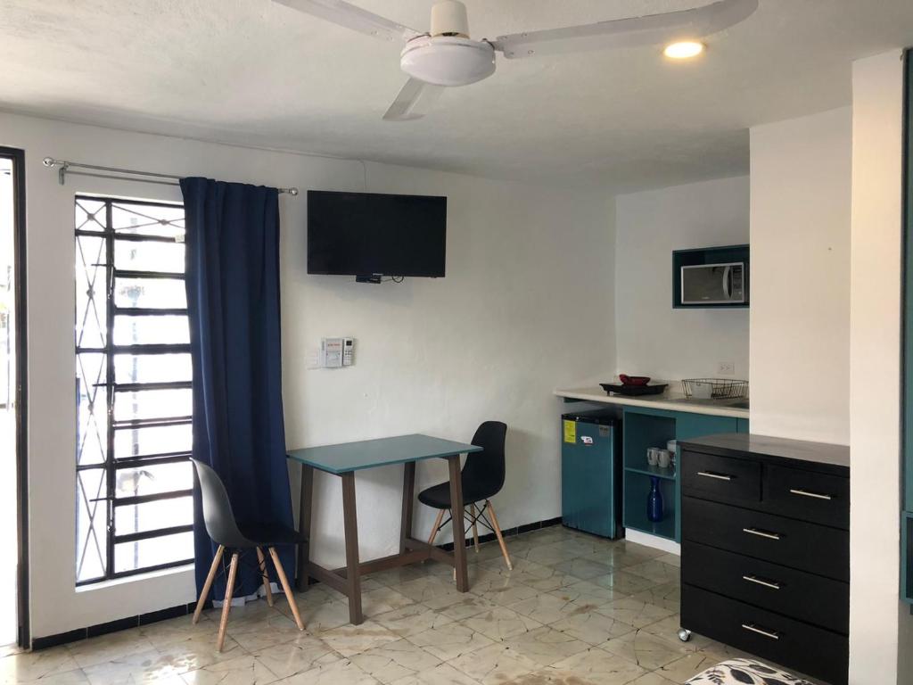 Televisor o centre d'entreteniment de Suites del Sureste - Mérida