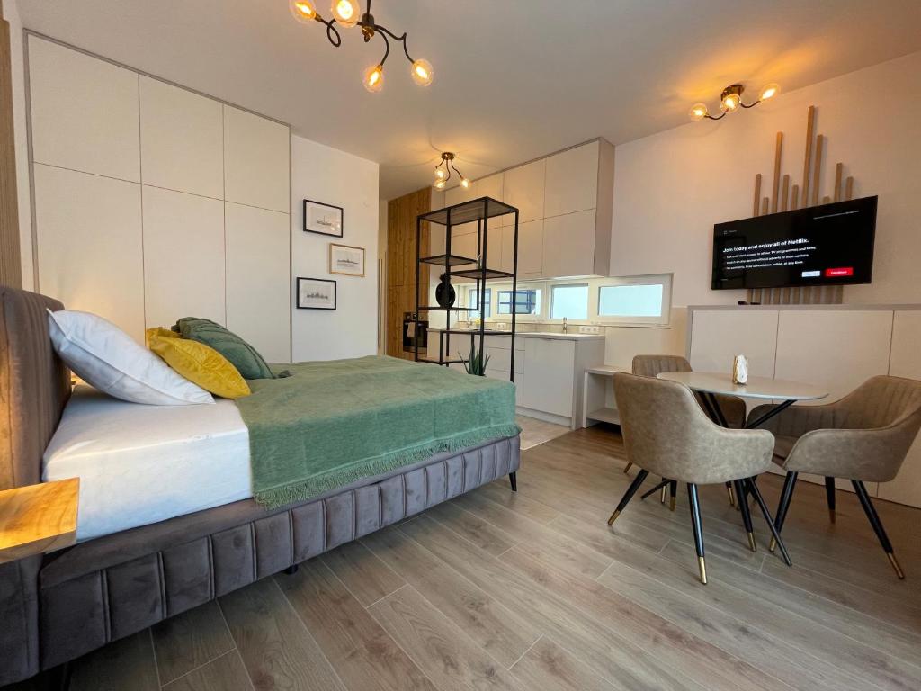 Posteľ alebo postele v izbe v ubytovaní Hillside Central Apartments