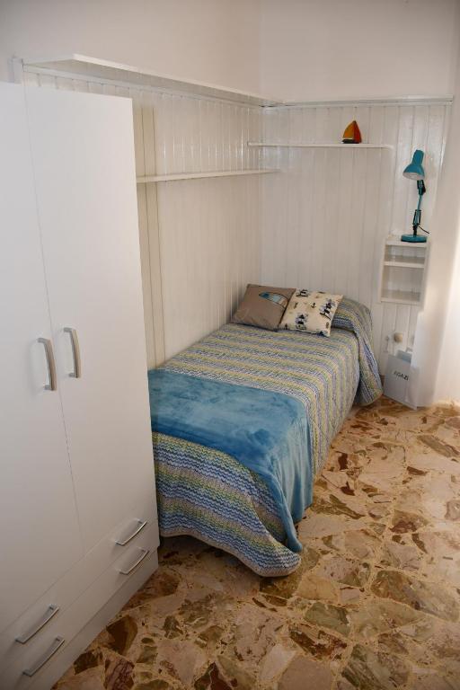 Postel nebo postele na pokoji v ubytování Soffio del Libeccio B&B