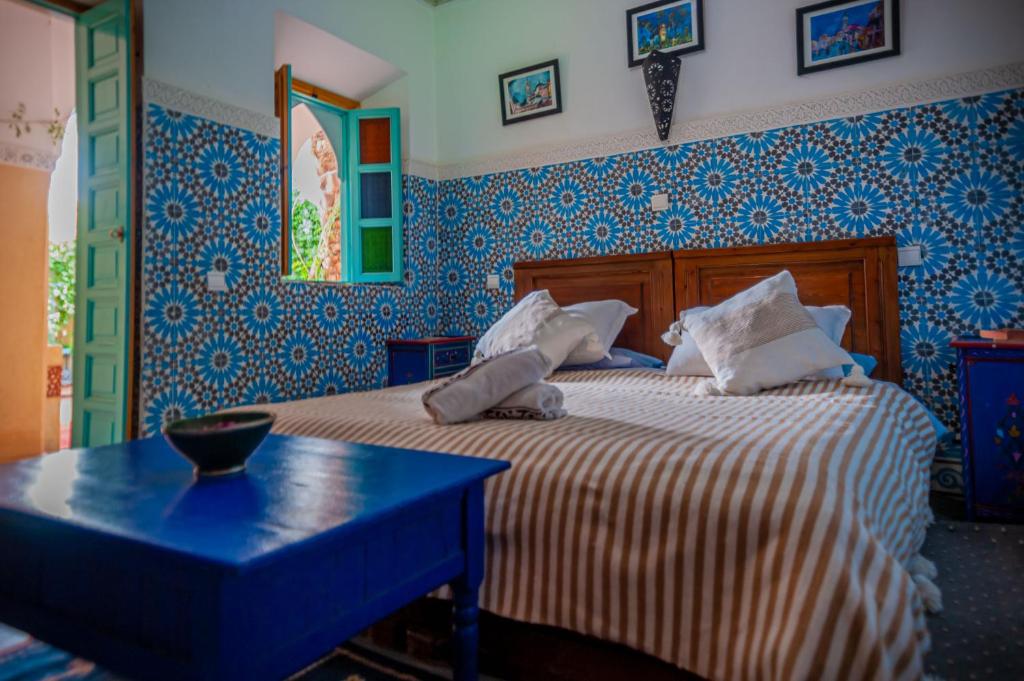 Postel nebo postele na pokoji v ubytování Riad Dar Mamouni