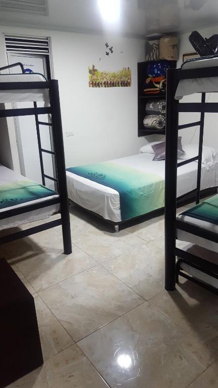 Postel nebo postele na pokoji v ubytování Hotel La Castellana
