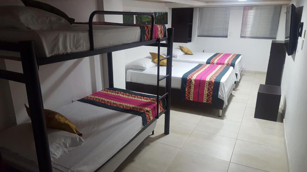 Postel nebo postele na pokoji v ubytování Hotel La Castellana