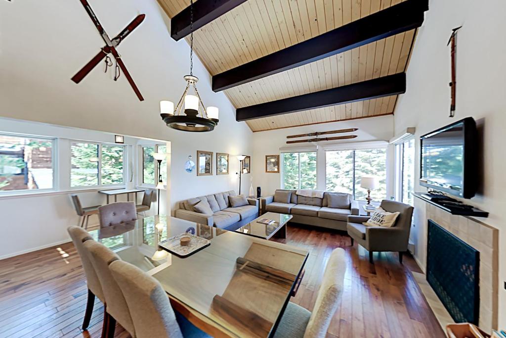 a living room with a table and a couch at Ski Bowl Condos Unit 518 in Truckee