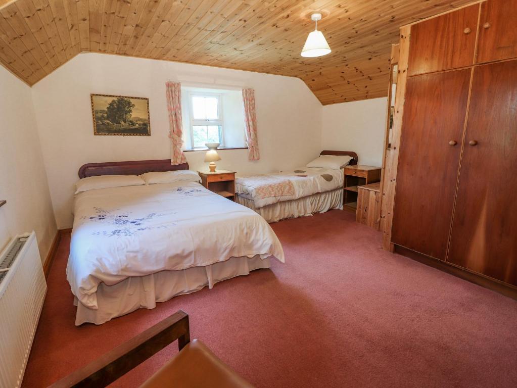 Voodi või voodid majutusasutuse Gortagown Cottage toas