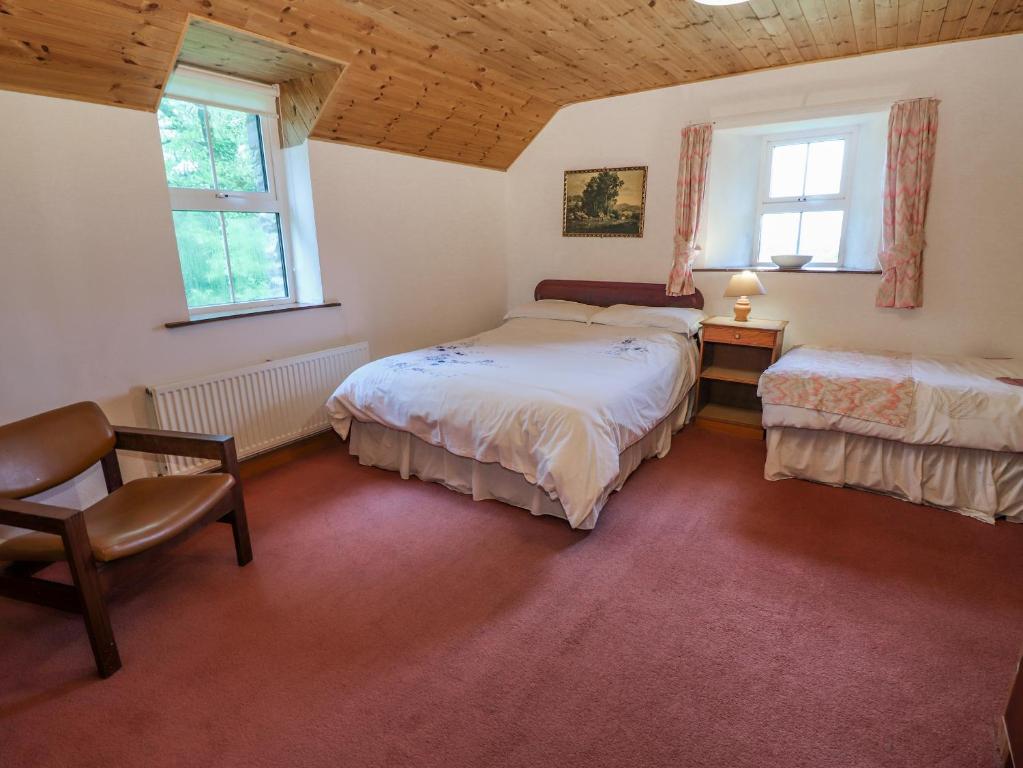 Voodi või voodid majutusasutuse Gortagown Cottage toas