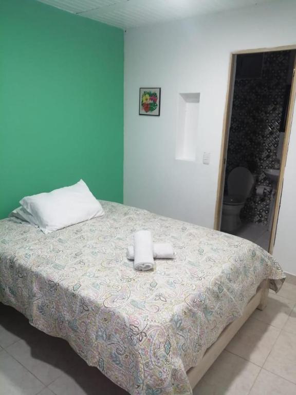 Postel nebo postele na pokoji v ubytování Casa Maral Hostal