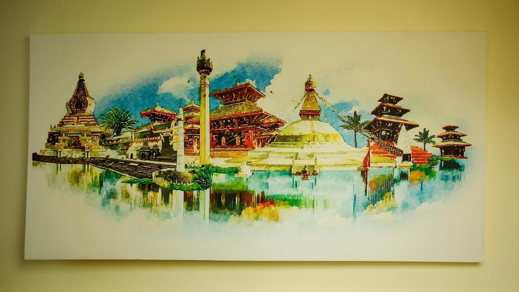 a painting of a painting of buildings on the water at Gauri Shankar Hotel Nagarkot in Nagarkot