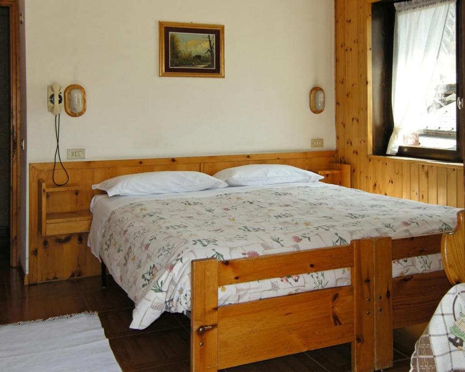 Postel nebo postele na pokoji v ubytování Hotel Federia