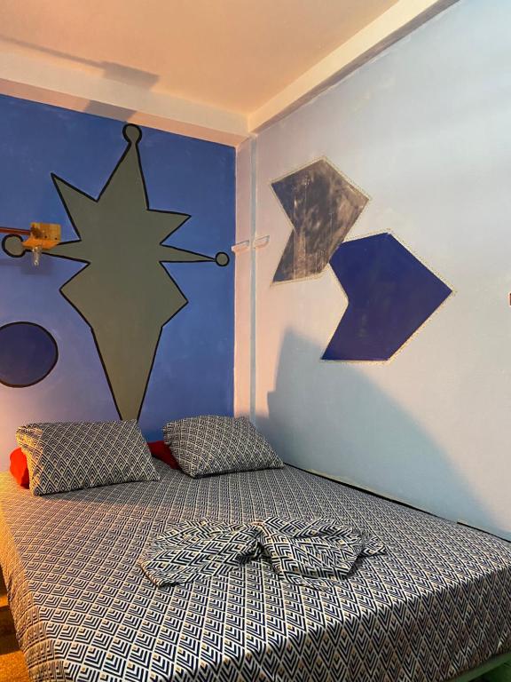 Postel nebo postele na pokoji v ubytování Zebulo Hostel