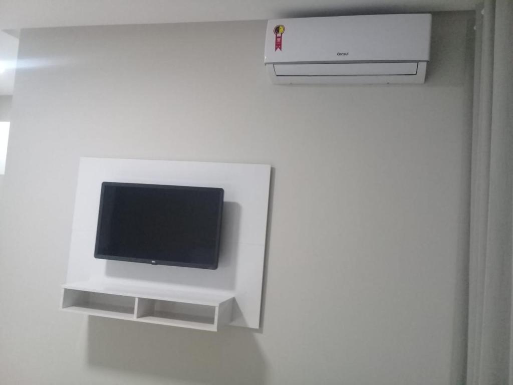TV a/nebo společenská místnost v ubytování O Neves Hotel