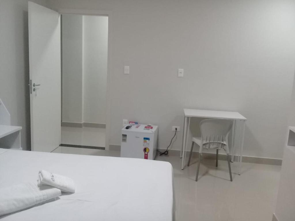 Postel nebo postele na pokoji v ubytování O Neves Hotel