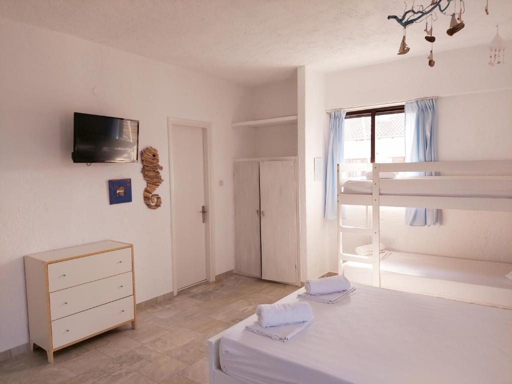 Ένα ή περισσότερα κρεβάτια σε δωμάτιο στο Brunis Apartments
