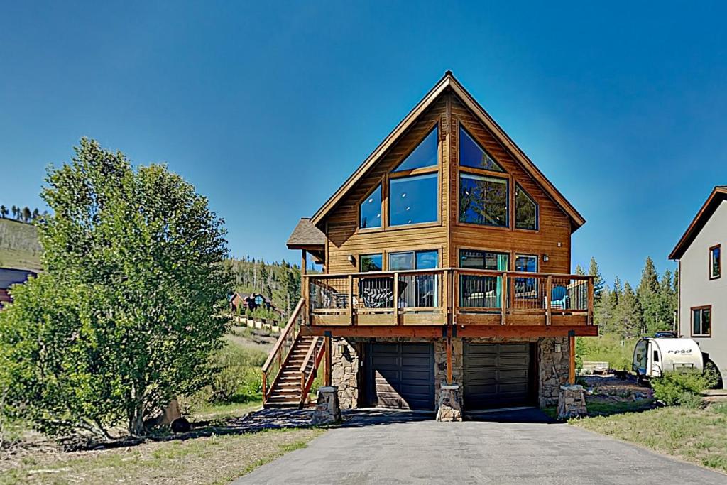 a large wooden house with a deck and a garage at Eagle Escape in South Lake Tahoe