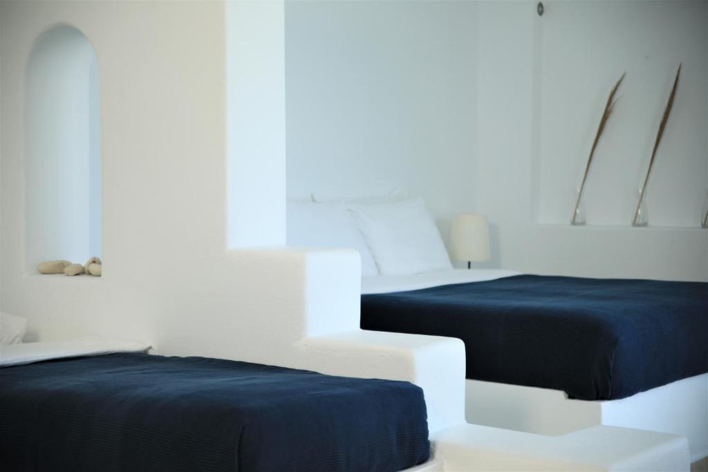 Postel nebo postele na pokoji v ubytování Harmony Hotel