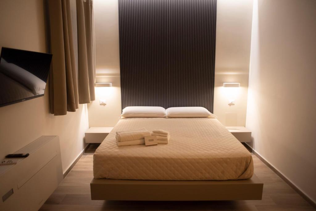 Postel nebo postele na pokoji v ubytování House Room Civico 56