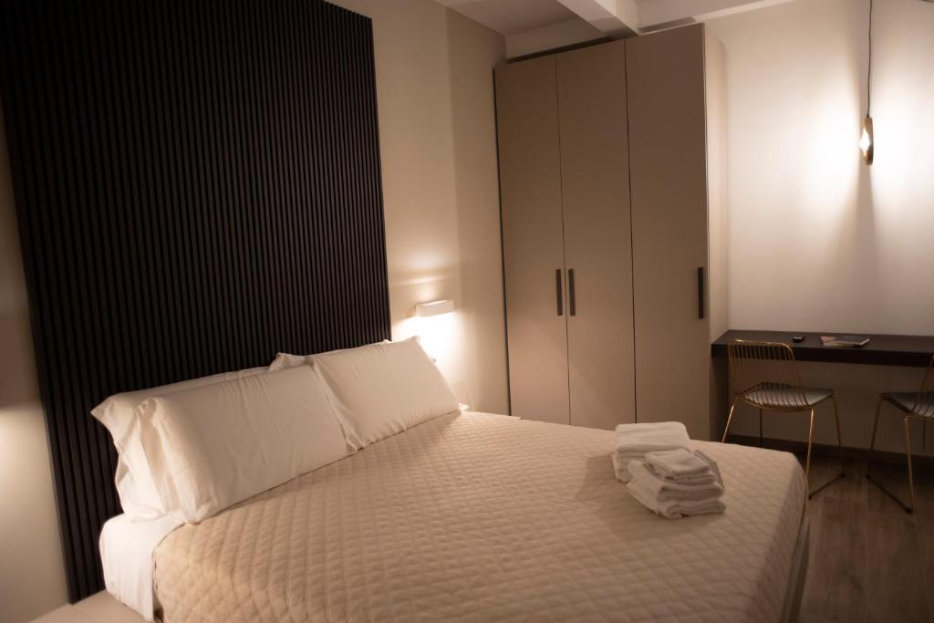 Postel nebo postele na pokoji v ubytování House Room Civico 56