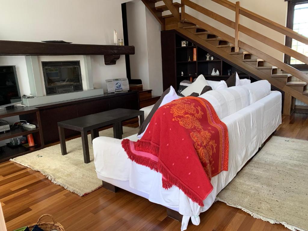 Near Como, charming apartment with fireplace tesisinde bir odada yatak veya yataklar
