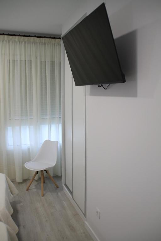 Sjónvarps- og/eða afþreyingartæki á Baixo a Lua Rooming