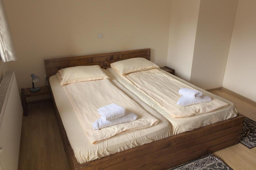 Postel nebo postele na pokoji v ubytování Cazare Rustic Nagy