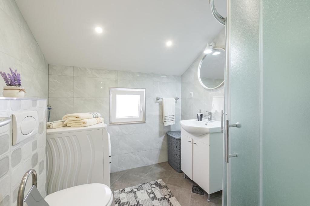 Kúpeľňa v ubytovaní Apartments Vukelic