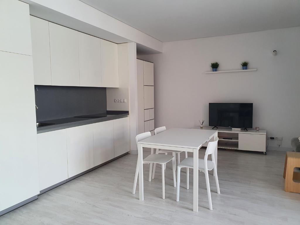 TV a/nebo společenská místnost v ubytování aeropuerto loft polígono