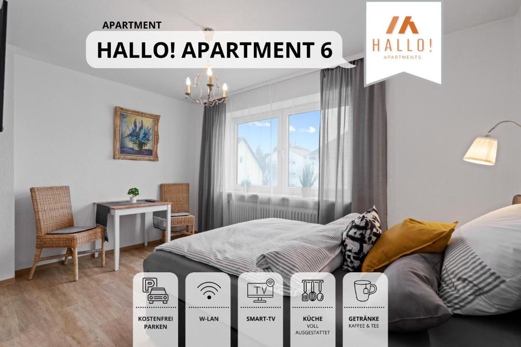 ein Schlafzimmer mit einem Bett und einem Schild, das das Apartment Hallo liest in der Unterkunft Gemütliche Ferienwohnung in bester Lage l Innenstadtnähe l 1 Minute zum Bahnhof l Küche l TV l Free-WLAN l Willkommen im Hallo!-Apartment 6 in Bad Wörishofen