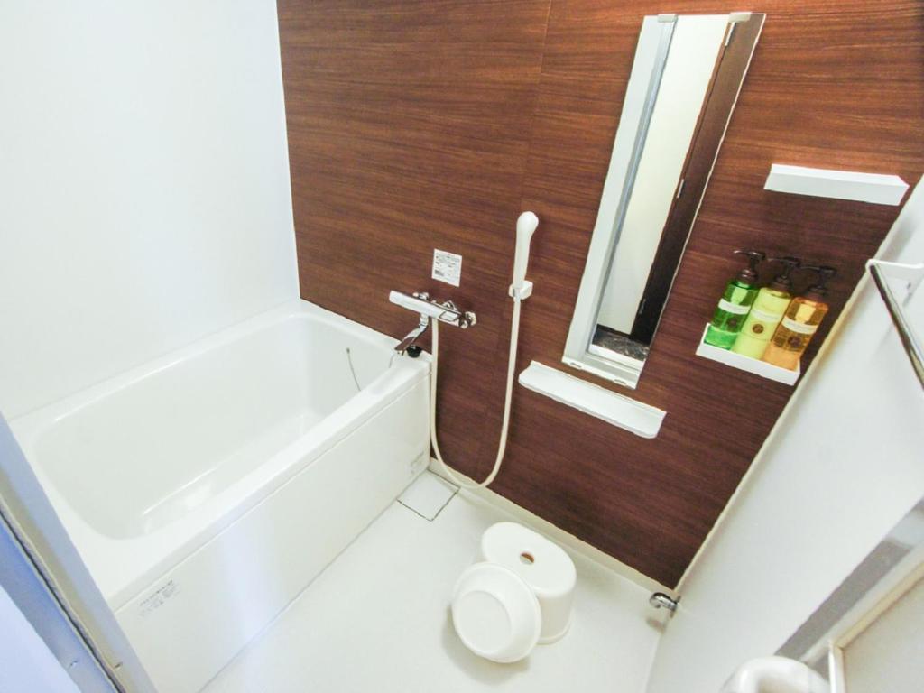 Koupelna v ubytování HOTEL LiVEMAX Kasai Ekimae
