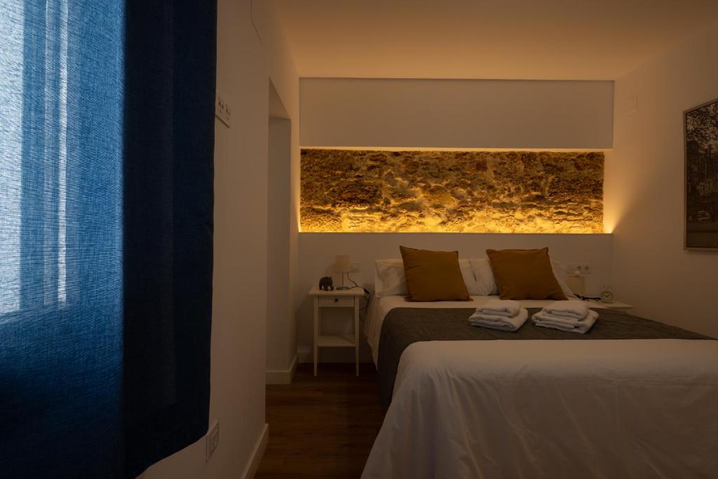 Posteľ alebo postele v izbe v ubytovaní El Sol & la Sal de Cádiz Little Apartments