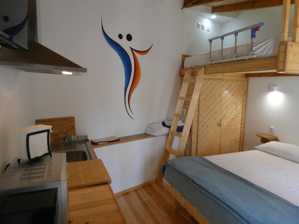 Uma cama ou camas num quarto em Casa do Ribeirinho