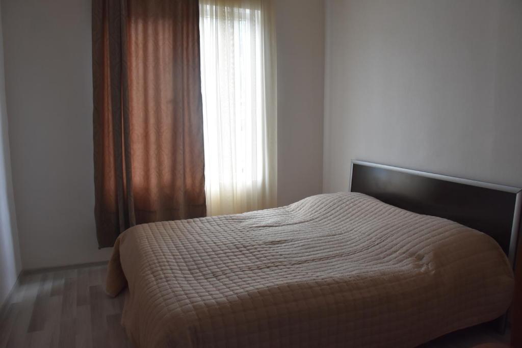 Postel nebo postele na pokoji v ubytování Guesthouse Natalia