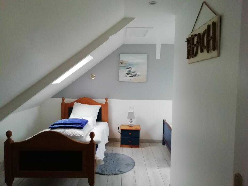 Postel nebo postele na pokoji v ubytování ANCRE BLEU