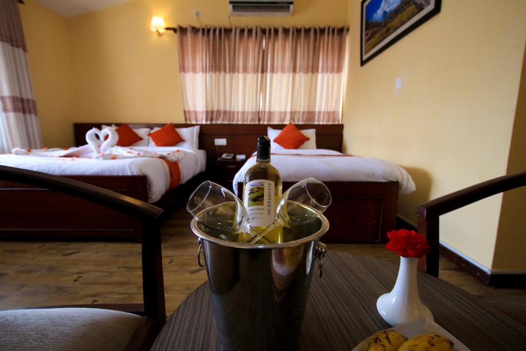 Postel nebo postele na pokoji v ubytování Sampada Garden Resort
