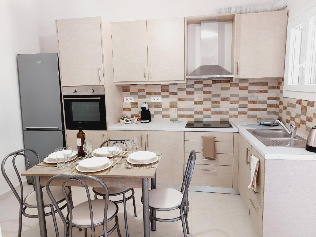 Kuchyň nebo kuchyňský kout v ubytování STAMATIS CORFU APARTMENTS